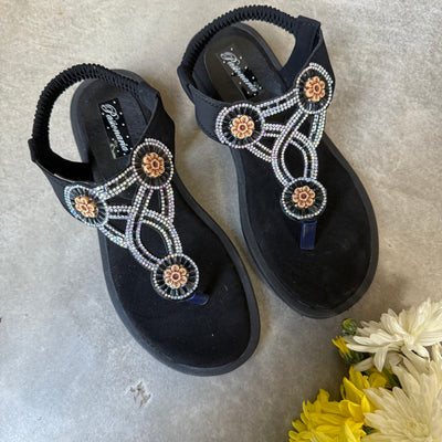 SANDALIAS VICTORIA OJOTA FLORES NEGRO STRASS TORNASOLADO