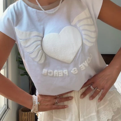 REMERA CUELLO REDONDO COLORES SUMMER ALAS BLANCO (Línea SWEETY)